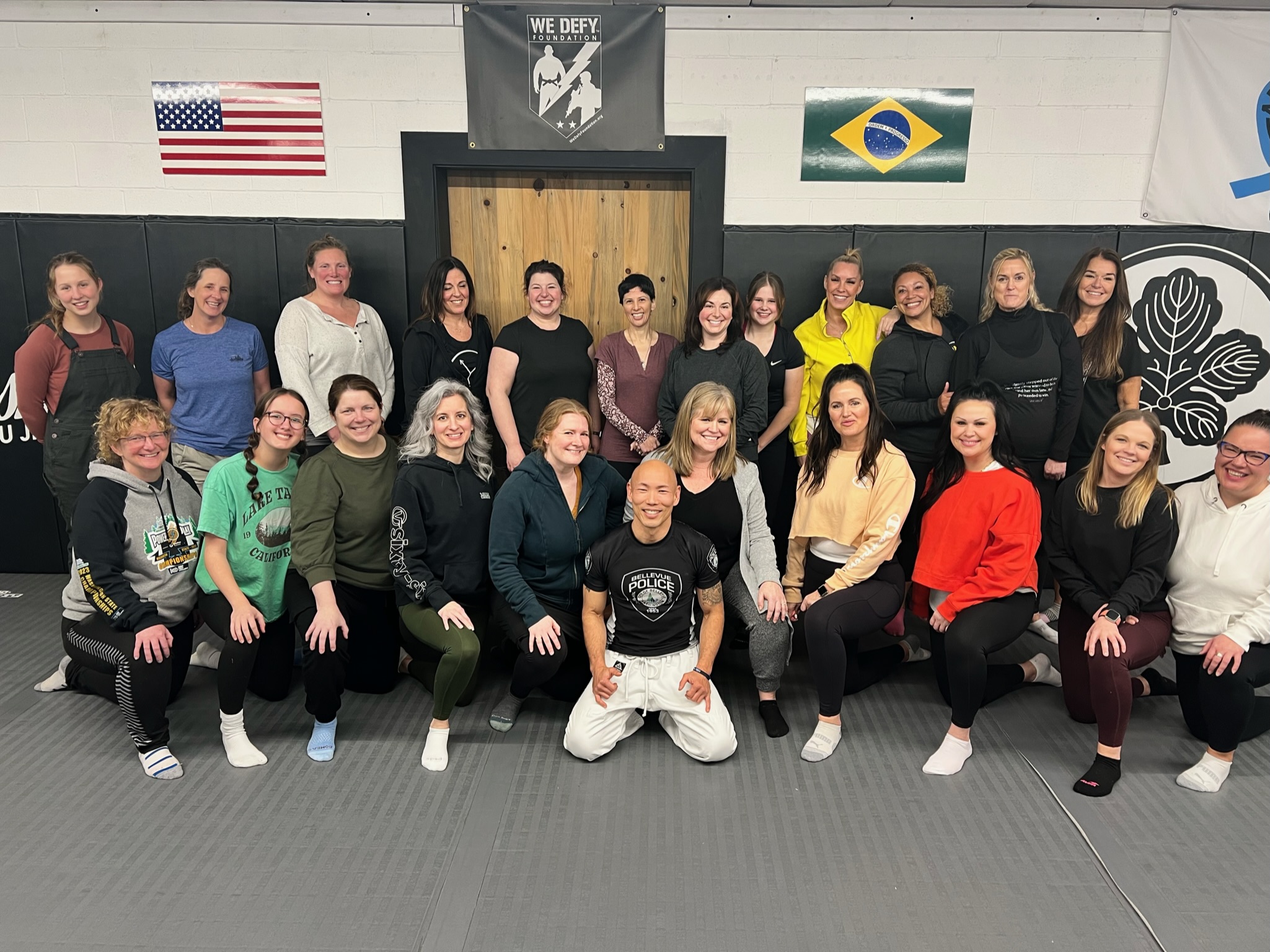 six degrees team and friends at self-defense class