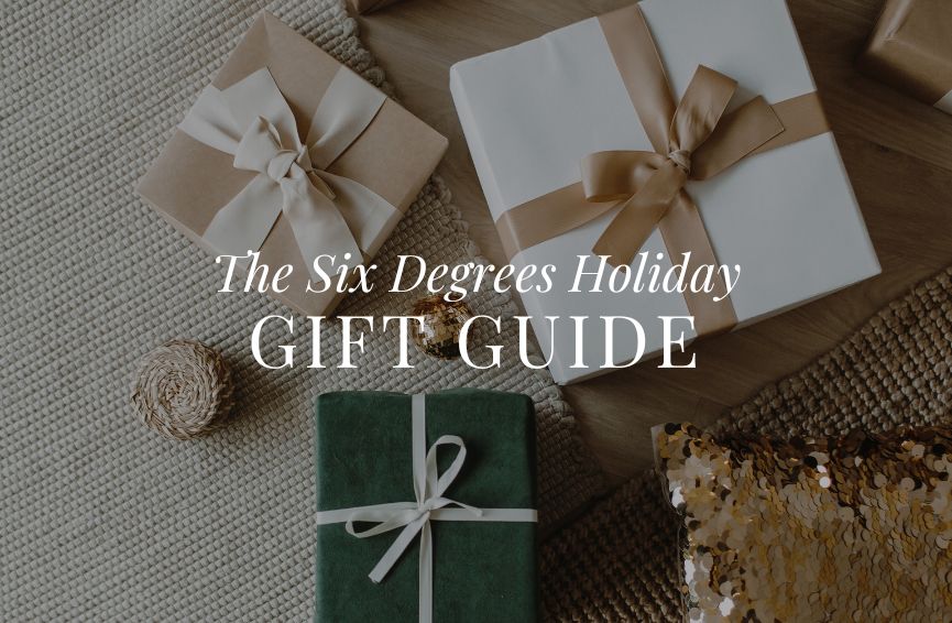 Gifts behind text that says "Six Degrees Holiday Gift Guide"